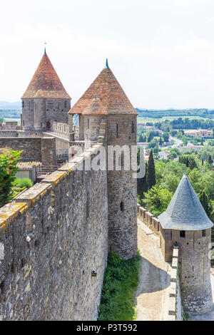 The medieval Cité of Carcassonne, French department of Aude, Occitanie Region, France. Outer walls, ramparts, turrets and towers. Stock Photo