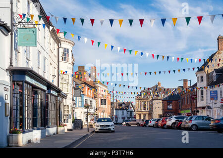 Shipston on stour high street shops in sunlight. Shipston on stour, Warwickshire, England Stock Photo