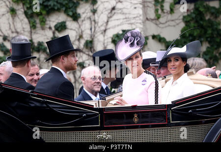 The Duke and Duchess of Sussex and Sophie the Countess of Wessex (centre) during day one of Royal Ascot at Ascot Racecourse. Stock Photo