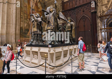 Seville Christopher Columbus monument, a tourist views the tomb of Christopher Columbus (Cristobal Colon) in Seville Cathedral (Catedral), Spain. Stock Photo