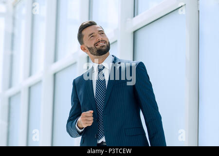 dreaming of a businessman standing in new office Stock Photo