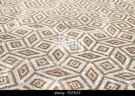 tile at The ancient city of Conimbriga is the largest Roman settlement in Portugal, near Coimbra, Portugal Stock Photo