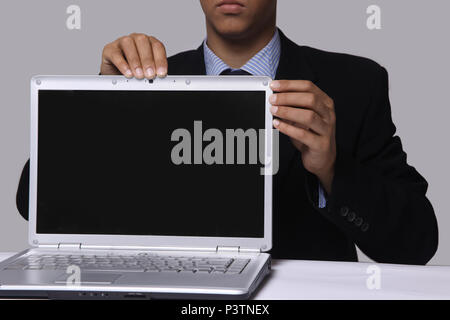 closeup.businessman shows a stylish notebook Stock Photo