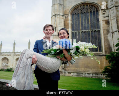 Cambridge, UK. 19th June, 2018. Trinity College Cambridge May Ball. Cambridge University students walk the streets of Cambridge after attending the Trinity College May Ball.  Picture by Andrew Parsons / Parsons Media Credit: andrew parsons/Alamy Live News Stock Photo