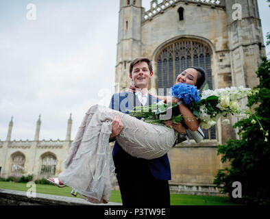 Cambridge, UK. 19th June, 2018. Trinity College Cambridge May Ball. Cambridge University students walk the streets of Cambridge after attending the Trinity College May Ball.  Picture by Andrew Parsons / Parsons Media Credit: andrew parsons/Alamy Live News Stock Photo