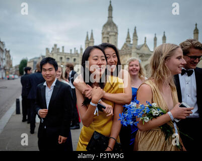 Cambridge, UK. 19th June, 2018. Trinity College Cambridge May Ball. Cambridge University students walk the streets of Cambridge after attending the Trinity College May Ball.  Picture by Andrew Parsons / Parsons Media Credit: andrew parsons/Alamy Live News Stock Photo