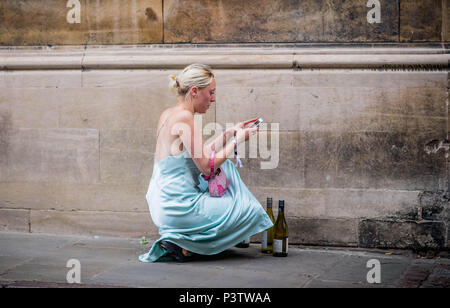 Cambridge, UK. 19th June, 2018. Trinity College Cambridge May Ball. Cambridge University students walk the streets of Cambridge after attending the Trinity College May Ball.  Picture by Andrew Parsons / Parsons Media Credit: andrew parsons/Alamy Live News Stock Photo