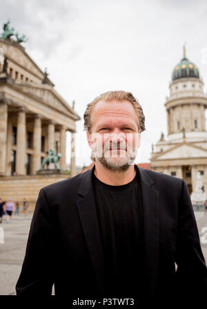 19 June 2018, Germany, Berlin: Pianist Sebastian Knauer standing on the Gendarmenmarkt in front of the concert house in Berlin after the press conference for the Classic Open Air Festival 2018. The festival is taking place from the 05 to the 09 July 2018 on the Gendarmenmarkt. Photo: Christoph Soeder/dpa-Zentralbild/dpa Stock Photo