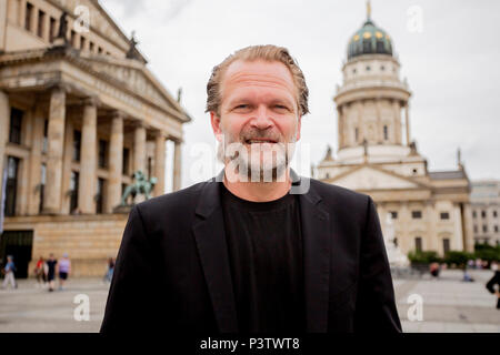 19 June 2018, Germany, Berlin: Pianist Sebastian Knauer standing on the Gendarmenmarkt in front of the concert house in Berlin after the press conference for the Classic Open Air Festival 2018. The festival is taking place from the 05 to the 09 July 2018 on the Gendarmenmarkt. Photo: Christoph Soeder/dpa-Zentralbild/dpa Stock Photo