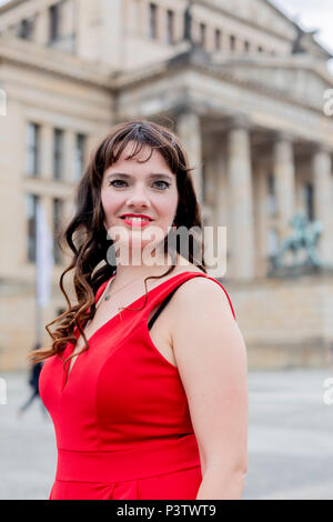 19 June 2018, Germany, Berlin: Soprano Gunta Cese standing on the Gendarmenmarkt in front of the concert house in Berlin after the press conference for the Classic Open Air Festival 2018. The festival is taking place from the 05 to the 09 July 2018 on the Gendarmenmarkt. Photo: Christoph Soeder/dpa-Zentralbild/dpa Stock Photo