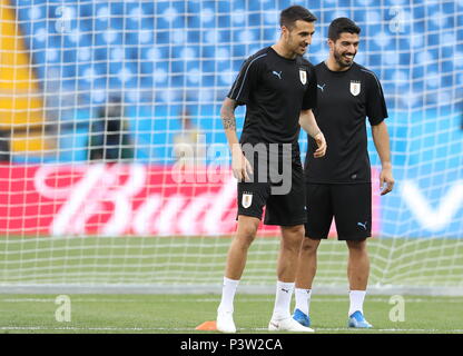 Rostov On Don. 19th June, 2018. Luis Suarez (R) of Uruguay attends a training session prior to a Group A match against Saudi Arabia at the 2018 FIFA World Cup in Rostov-on-Don, Russia, on June 19, 2018. Credit: Lu Jinbo/Xinhua/Alamy Live News Stock Photo