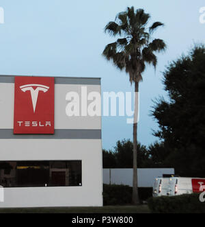 Eatonville, Florida, USA. 19th Jun, 2018.  Tesla mobile service vans are seen at the Tesla store in Eatonville, Florida, near Orlando on June 19, 2018. Tesla has been plagued by a number of problems as it attempts to increase its production of the Model 3 sedan to 5,000 a week by early July, in an effort to become profitable. A Tesla Model S spontaneously caught fire recently on a Los Angeles street.  Stock Photo