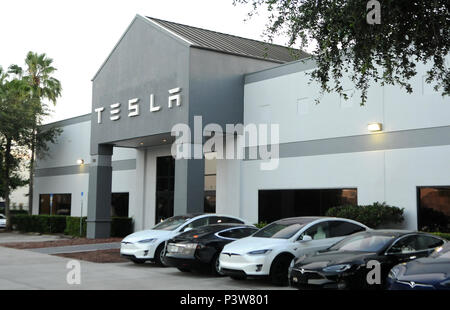 Eatonville, Florida, USA. 19th Jun, 2018. Electric cars are seen at the Tesla store in Eatonville, Florida, near Orlando on June 19, 2018. Tesla has been plagued by a number of problems as it attempts to increase its production of the Model 3 sedan to 5,000 a week by early July, in an effort to become profitable. A Tesla Model S spontaneously caught fire recently on a Los Angeles street.  Stock Photo