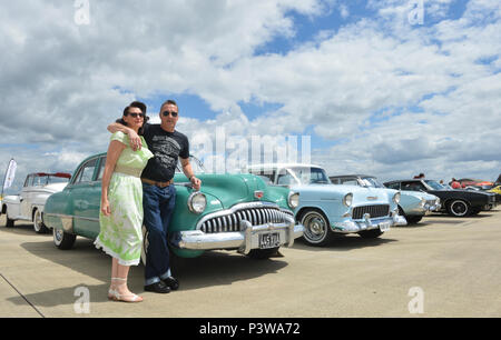 A senior couple poses in front of Grandma's Coffee House in Keokea in ...