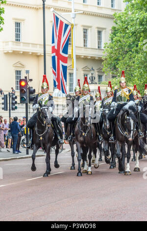 A detachment of the Blues and Royals british royal household cavalry return to Horse Guards Parade after escorting the queen at her birthday celebrati Stock Photo