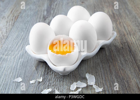 Six Large White Eggs on a White Ceramic Dish Stock Photo