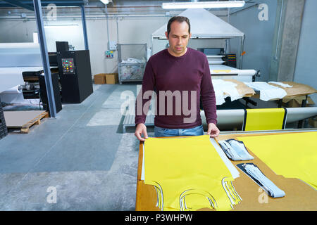 production operator man in fashion transfer industry factory Stock Photo