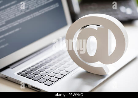 Email symbol on business laptop computer concept for internet, contact us and e-mail address Stock Photo