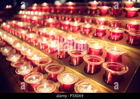 Memorial candles in cathedral or church Stock Photo