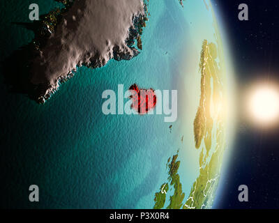 Iceland during sunrise highlighted in red on planet Earth with clouds ...