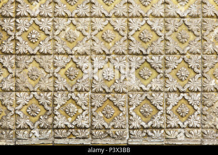 Traditional Portuguese azulejo tiles on the building in Porto, Portugal. Background texture. Stock Photo