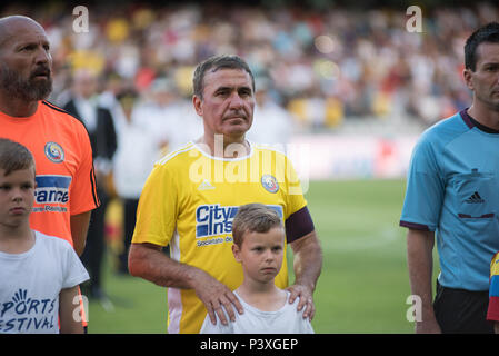 CLUJ, ROMANIA - JUNE 16, 2018: Football player Gheorghe Hagi (Romania Golden Team) and Barcelona Legends entering the playfield at the beginning of a  Stock Photo