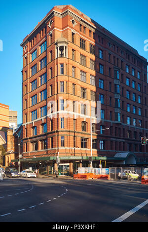 Sydney Central Youth Hostel Association, with half the building in sun and half in shadow, Rawson Place, Haymarket, Sydney, Australia Stock Photo