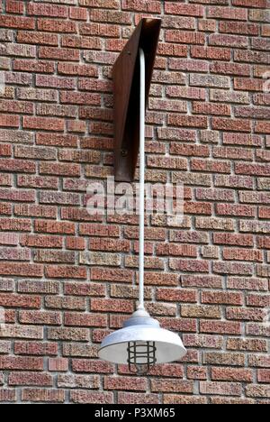 Outside light on a brick wall Stock Photo