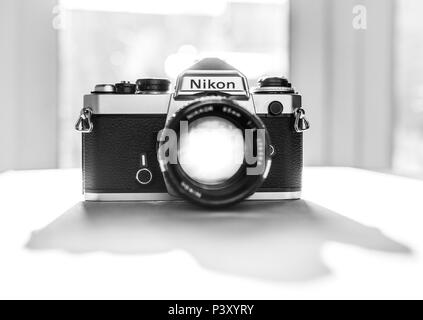 Nikon FE single lens reflex 35mm professional film camera, First launched in 1978 and remained in production until 1983. Stock Photo