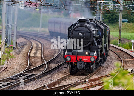 Winwick Cheshire United Kingdom.  18th June 2018. The world’s most famous steam locomotive, LNER A3 Class 4-6-2 no 60103 Flying Scotsman seen crossing Stock Photo