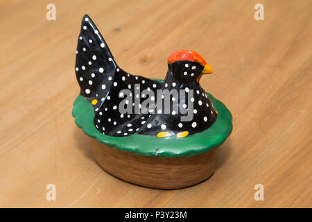 Artesanato representando uma galinha d'angola. Stock Photo