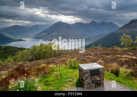 Orientation table at the Bealach Ratagain / Ratagan viewpoint with names of the mountain summits of the Five Sisters of Kintail, Highland, Scotland Stock Photo