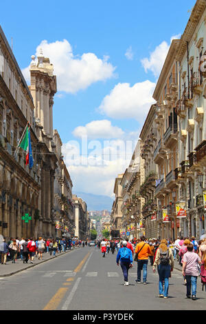 Catania, The Central "Via Etnea" Street With The Snow Covered Mount ...