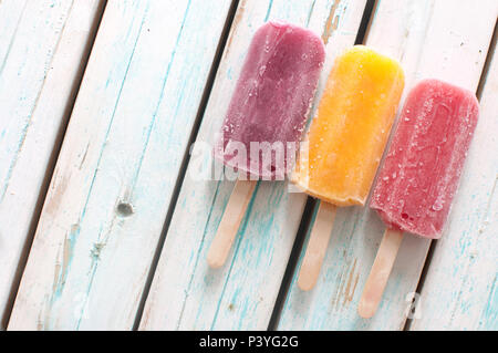 Various flavored ice popsicles Stock Photo