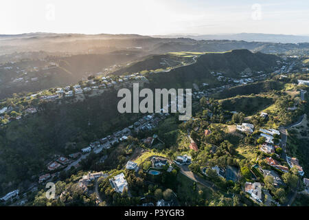 Aerial view of South Beverly Park canyon and hilltop homes in the Santa Monica Mountains above Beverly Hills and Los Angeles, California. Stock Photo