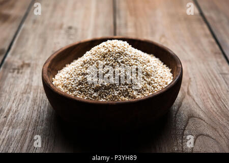 Amaranth or rajgira lahi in a bowl with sweet laddu. selective focus Stock Photo