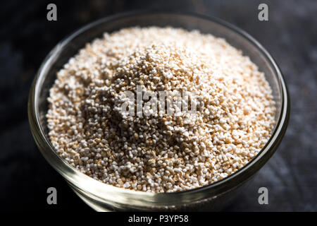 Amaranth or rajgira lahi in a bowl with sweet laddu. selective focus Stock Photo