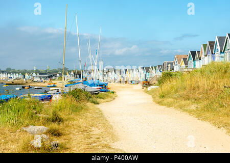 Beach huts along Mudeford Spit, Hengistbury Head, Christchurch, Dorset, UK Stock Photo