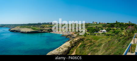 view of crowded sardinian beach of Balai, inside the city of Porto Torres, in sunny day of summer Stock Photo