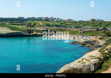 view of crowded sardinian beach of Balai, inside the city of Porto Torres, in sunny day of summer Stock Photo