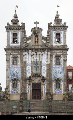 Church of Saint Ildefonso (Igreja de Santo Ildefonso) in Batalha Square in Porto, Portugal. The church was built in the first half of the 18th century. Azulejo tiles on the outside walls were painted in 1932 by Portuguese painter Jorge Colaço. Stock Photo