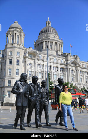 The new Beatles Statue on the renovated Pier Head on the Waterfront in Liverpool, on Merseyside, NW England, UK Stock Photo