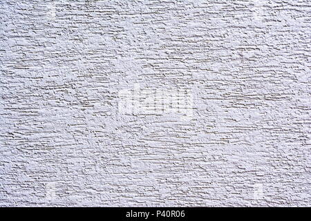 Painted wall with rough texture closeup photo Stock Photo