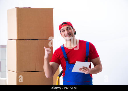 Contractor worker moving boxes during office move Stock Photo