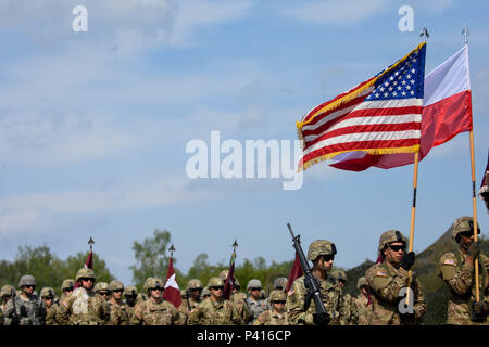 421st Medical Battalion (Multifuntional) conducts a Relinquishment of Command Ceremony in Torun, Poland during Anakonda 16, a Polish Military led exercise, on June 2. 421st MMB is providing NATO ROLE 1 and 2 support (557th Area Support Medical Company), food and water risk assessments along with base camp assessments (64th Medical Detachment VSS and 71st Medical Detachment Preventive Medicine), and behavioral health services (254th Combat Operational Stress Control) in various locations in Poland during the exercise. (U.S. Army photo by Capt. Jeku Arce, 30th Medical Brigade Public Affairs) Stock Photo