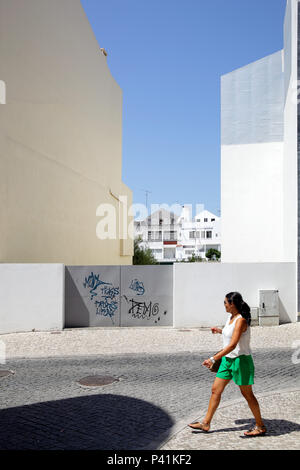 Caldas da Rainha, Portugal, passerby and residential building in Caldas da Rainha Stock Photo