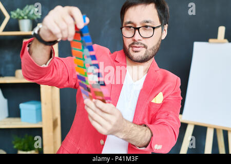 Creative designer working with coloring palettes Stock Photo