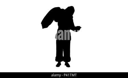 Silhouette Real Santa Claus carrying big bag full of gifts  Stock Photo