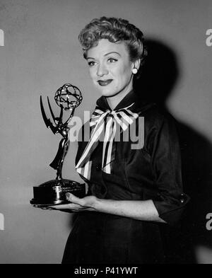 Description: Oct. 31, 1954 - EVE ARDEN with her Emmy award of her best female TV actress of year for performances in Our Miss Brooks 1954..  Stars: EVE ARDEN. Stock Photo