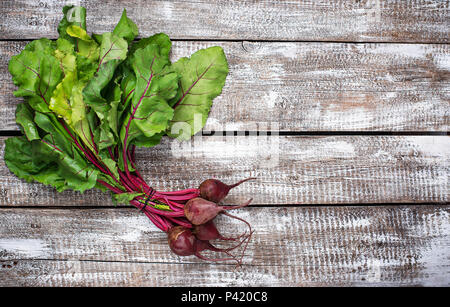 Beetroots on a wooden background Stock Photo